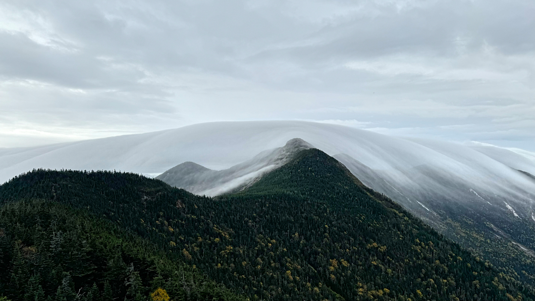 Clouds pouring over Gothics